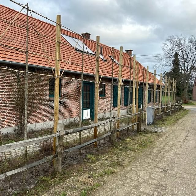 A building and greens getting maintenance