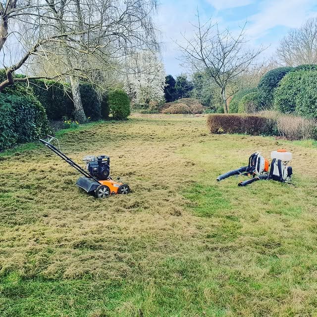 Lawn being mowed with machines